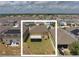 Aerial view of a fenced backyard and tan two-story home with a screened in patio, set in a community at 651 Taft Dr, Davenport, FL 33837