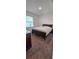 Bright bedroom with a queen bed, and neutral decor at 651 Taft Dr, Davenport, FL 33837