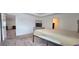 Bedroom with gray carpeting, a bed frame, a dresser, and a TV at 651 Taft Dr, Davenport, FL 33837