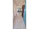 Inviting entryway with neutral tile flooring, leading to an open dining and living area at 651 Taft Dr, Davenport, FL 33837