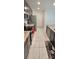 Well-lit kitchen with stainless steel appliances and granite countertops at 651 Taft Dr, Davenport, FL 33837