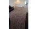 Large loft area featuring carpeting and ample space for living and entertaining at 651 Taft Dr, Davenport, FL 33837