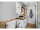 Well-lit bathroom featuring a toilet, vanity, and decorative accents at 706 Hillcrest St, Orlando, FL 32803