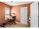 Bright bedroom featuring a wooden desk, chair, and a window providing natural light at 706 Hillcrest St, Orlando, FL 32803