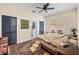 Bedroom boasts hardwood floors, ceiling fan, and closet at 706 Hillcrest St, Orlando, FL 32803