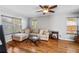 Comfortable living room with hardwood floors, sectional sofa, and natural light at 706 Hillcrest St, Orlando, FL 32803