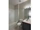 Bathroom with a shower/tub combo, toilet, and vanity at 7147 Yacht Basin # 132, Orlando, FL 32835