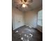 This bedroom features neutral walls, carpet flooring, and a ceiling fan at 7147 Yacht Basin # 132, Orlando, FL 32835