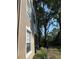 This building offers a screened patio, lush landscaping, and ample windows at 7147 Yacht Basin # 132, Orlando, FL 32835