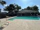 The community pool area features plenty of lounge seating at 7147 Yacht Basin # 132, Orlando, FL 32835
