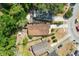 Overhead view showing the house with a brown roof and a fenced backyard at 7951 Chediston Cir, Orlando, FL 32817
