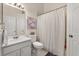 Neutral bathroom with shower and tub combo at 7951 Chediston Cir, Orlando, FL 32817
