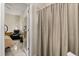 A view from the bedroom into the en-suite bathroom at 7951 Chediston Cir, Orlando, FL 32817