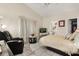 This bedroom features neutral colors with a view of the en-suite bathroom at 7951 Chediston Cir, Orlando, FL 32817