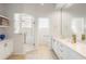 Modern bathroom with dual sinks, glass enclosed shower, and tile floor at 842 Bentley Green Cir, Winter Springs, FL 32708