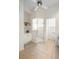 Modern bathroom with tile floor, glass enclosed shower, and ceiling fan at 842 Bentley Green Cir, Winter Springs, FL 32708