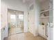 Bright bathroom with tile floor, glass enclosed shower, and linen closet at 842 Bentley Green Cir, Winter Springs, FL 32708