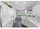 Bright eat-in kitchen featuring stainless steel appliances, and a breakfast nook overlooking the lush backyard at 842 Bentley Green Cir, Winter Springs, FL 32708