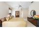 Spacious main bedroom suite with carpet, fan, and en suite bathroom at 842 Bentley Green Cir, Winter Springs, FL 32708