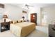 Spacious main bedroom with carpet, fan, window, and en suite bathroom at 842 Bentley Green Cir, Winter Springs, FL 32708