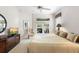 Main bedroom suite features a ceiling fan, carpet and sliding glass doors at 842 Bentley Green Cir, Winter Springs, FL 32708