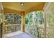 Private balcony features a nature view, and ample space for outdoor enjoyment at 8818 Villa View Cir # 304, Orlando, FL 32821