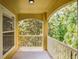 Enjoy the scenic views from this inviting balcony with neutral colors and natural light at 8818 Villa View Cir # 304, Orlando, FL 32821