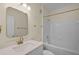 Clean bathroom featuring a shower-tub combo and single vanity with a white countertop at 8818 Villa View Cir # 304, Orlando, FL 32821