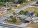 Aerial view of the property, its carport, and neighborhood surroundings at 99 Rainbow Dr. # 4, Haines City, FL 33844