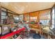 Sunroom with natural light, lots of storage, and plenty of space at 99 Rainbow Dr. # 4, Haines City, FL 33844