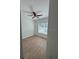 Bright bedroom features a modern ceiling fan and light wood floors at 1007 Colyer St, Orlando, FL 32805