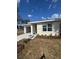 One-story home featuring a tidy front yard and a convenient attached garage at 1007 Colyer St, Orlando, FL 32805