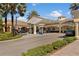 Community gas station with covered pumps and well-maintained landscaping at 10819 Savona Way, Orlando, FL 32827