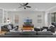 Spacious living room with a comfortable seating arrangement and scenic backyard view at 10819 Savona Way, Orlando, FL 32827
