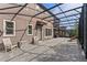 Outdoor patio featuring a large covered area with comfortable seating and view of the backyard at 10819 Savona Way, Orlando, FL 32827