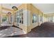 Storefront featuring large windows, signage, and a shaded walkway at 10819 Savona Way, Orlando, FL 32827