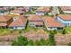 Aerial view showcasing the home's backyard and its location within the neighborhood at 1115 Oak Bluff Dr, Davenport, FL 33837
