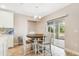 Bright dining area with backyard access and chandelier at 1115 Oak Bluff Dr, Davenport, FL 33837