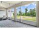 Enclosed patio with grey pavers is perfect for outdoor entertaining at 1115 Oak Bluff Dr, Davenport, FL 33837