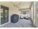 Covered patio with pavers, string lights, and comfortable seating at 1115 Oak Bluff Dr, Davenport, FL 33837