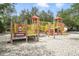 Outdoor playground for with a swing set, slide, and climbing structure for active play at 1115 Oak Bluff Dr, Davenport, FL 33837
