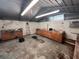 Interior view of garage featuring cabinets and peg board at 1206 Olen Dr, Daytona Beach, FL 32117