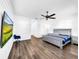 Spacious main bedroom featuring a modern color scheme and ample space at 1210 Lone Palm Way, St Cloud, FL 34771