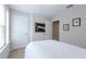 Cozy bedroom featuring neutral walls, carpet flooring, and white doors at 1255 Marley Ln, Winter Springs, FL 32708