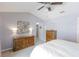 A bright bedroom with a queen size bed, vaulted ceiling and antique dressers at 1255 Marley Ln, Winter Springs, FL 32708