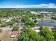 Expansive aerial view of neighborhood, showcasing lush greenery, ponds, and clear blue skies at 1263 Dunbar St, Altamonte Springs, FL 32701