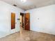 Unfinished bedroom with damaged walls and flooring. Renovation opportunity at 1263 Dunbar St, Altamonte Springs, FL 32701