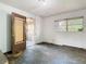 Empty room to be renovated; needs floors and walls, ready for a fresh interior design at 1263 Dunbar St, Altamonte Springs, FL 32701
