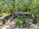 Cozy single-story brick home with a fenced yard and mature trees, perfect for a starter home at 1263 Dunbar St, Altamonte Springs, FL 32701