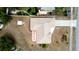 Drone shot showing a house's roof, yard and driveway at 1312 Catalina Blvd, Deltona, FL 32725